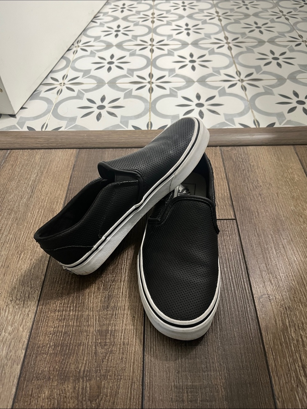Van’s Slip-On Casual Sneakers in Black